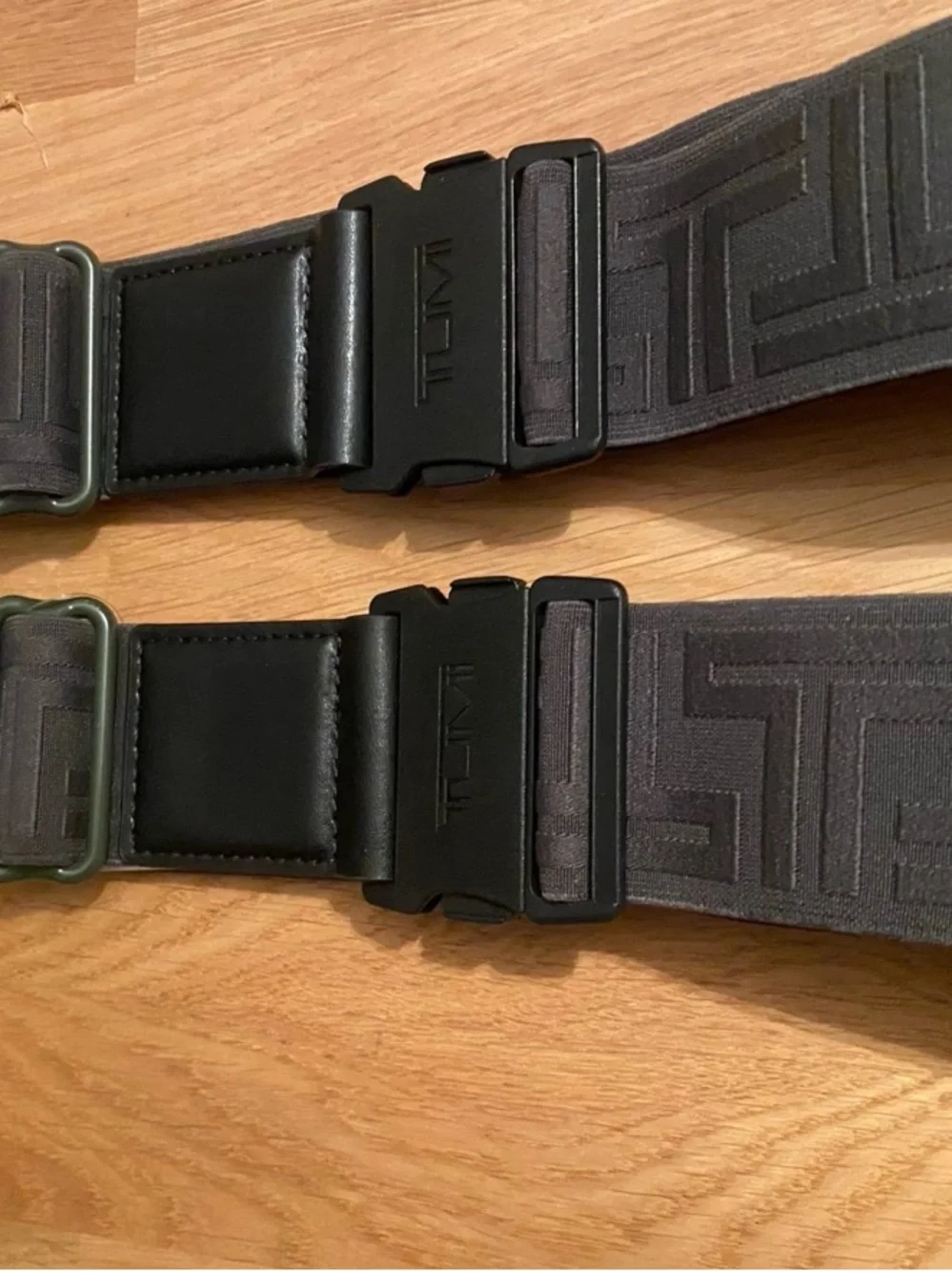2xTumi dark olive green luggage straps